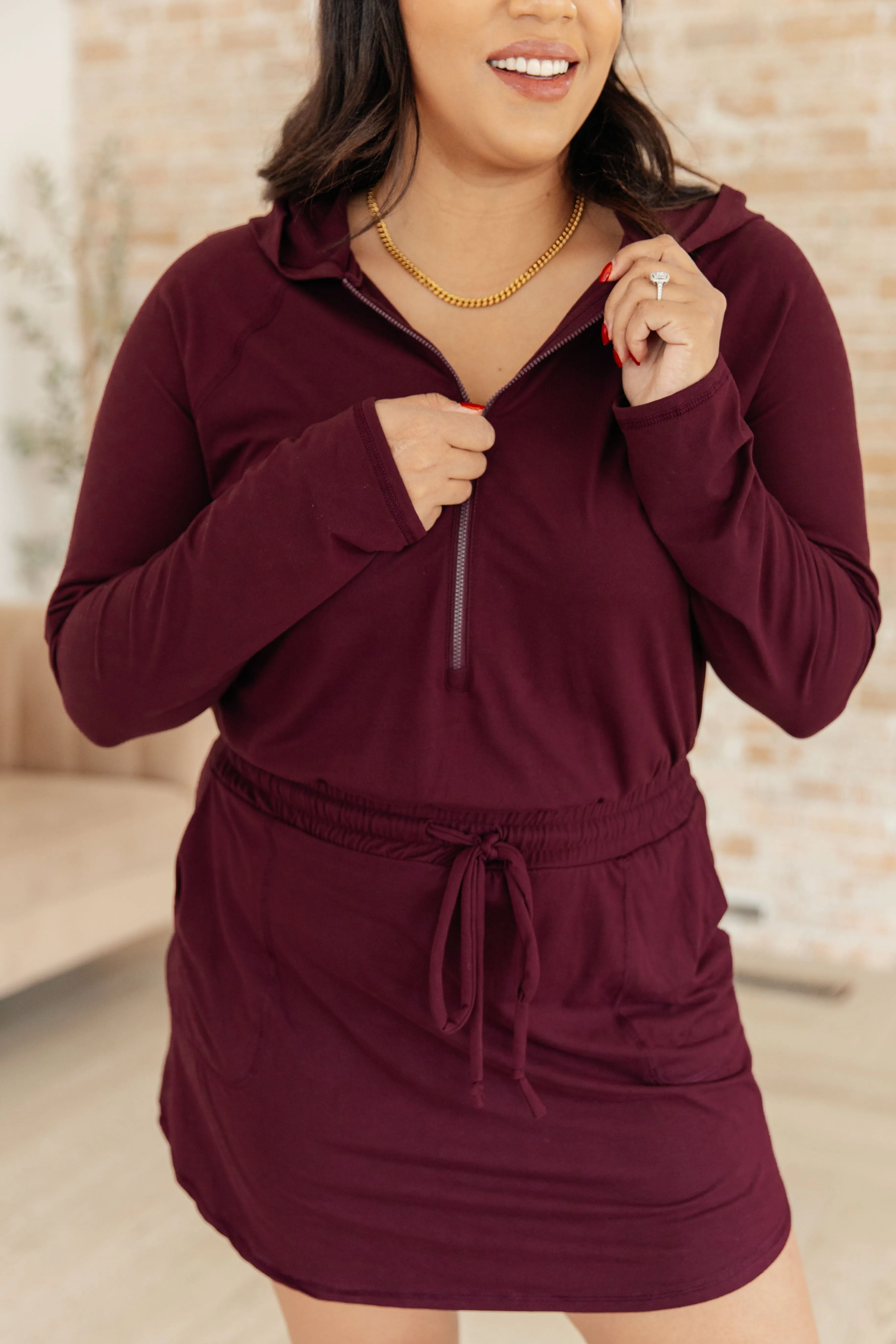 Getting Out Long Sleeve Hoodie Romper in Maroon by Rae Mode